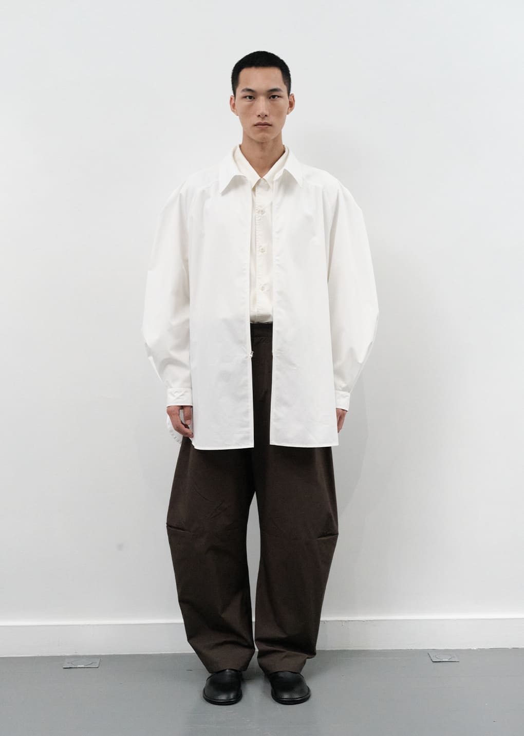 curved zip pants, brown hover