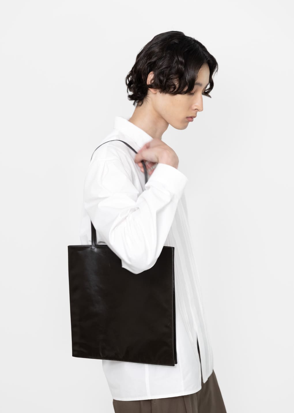 large slim leather bag, dark brown